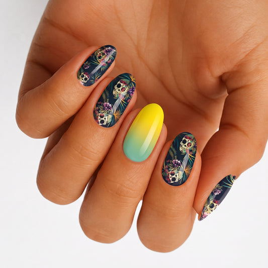 Navy nail wraps with tropical sugar skull floral print, yellow-to-teal ombre accent nail