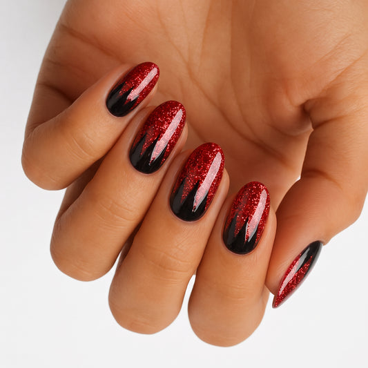Semi-cured gel nail wraps with red glitter and black flame-tip design, glossy finish