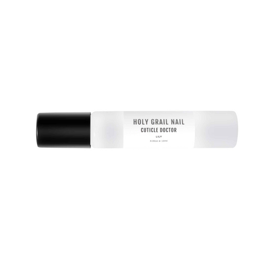 White lily cuticle oil treatment pen with black cap for nail care