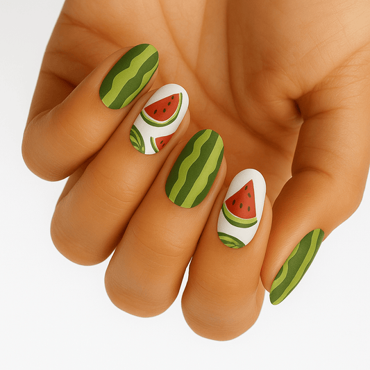 Watermelon nail art wraps on hand showing green striped and red slice designs