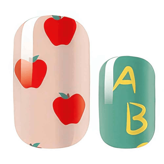 Apple print nail wraps with green alphabet design for back-to-school nail art