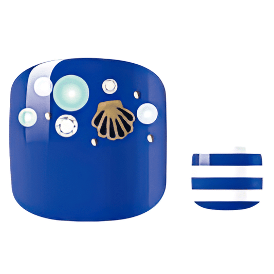 Blue pedicure nail wraps featuring white shells and seaside pattern for summer toes