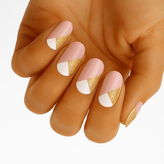 Pink and gold geometric nail wraps on hand showing elegant triangular pattern design