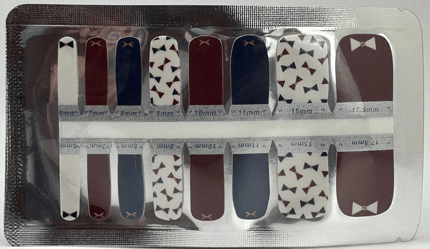 Pedicure nail wraps with red navy and white bowtie patterns for toenails