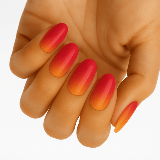 Sunset ombre gel nail wraps in coral pink orange gradient on hand