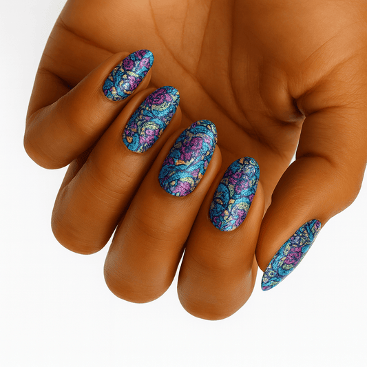 Colourful floral pattern nail wraps on hand showing blue pink purple psychedelic design