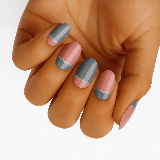 Pink and grey colour block nail wraps on hand showing at-home manicure design