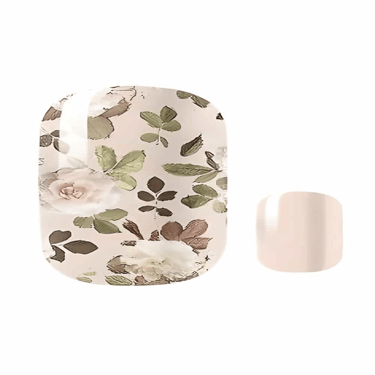 Botanical pedicure nail wrap with nude base and green leaf floral pattern design