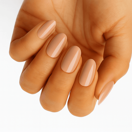 Glossy caramel brown nude nail wraps on hand showing natural oval manicure finish
