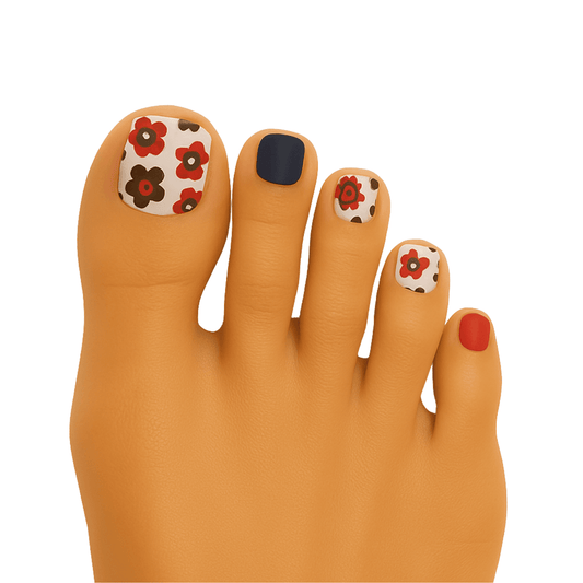 Floral pedi nail wraps with red and navy daisy pattern on foot toes