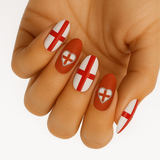 Hand wearing red and white England flag nail wraps with St George's cross design