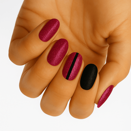 Burgundy metallic nail wraps with black stripe accent nail on hand manicure