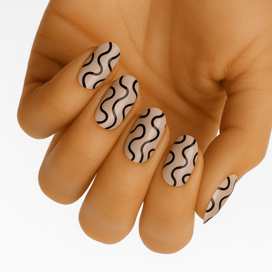 Black wavy line nail wraps on hand showing abstract minimalist nail art design
