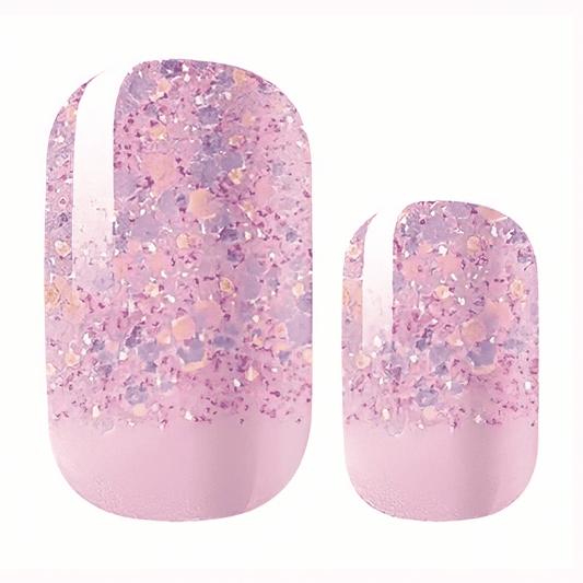 Pink glitter gradient nail wraps with rose gold sparkles for glamorous at-home manicures