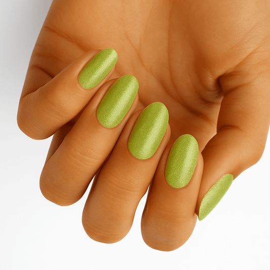 Lime green metallic shimmer nail wraps on hand showing glossy citrus finish