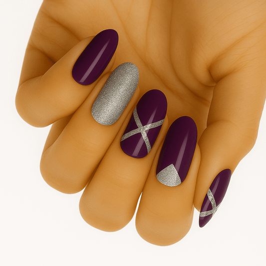 Purple and silver glitter gel nail wraps with geometric patterns on hand manicure