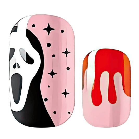 Halloween nail wraps featuring black ghost face, pink base with stars and red drip design