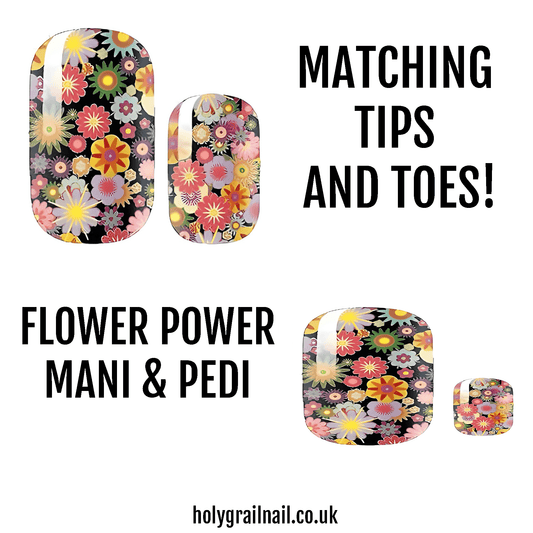 Retro flower power nail wraps with multicoloured blooms on dark base matching manicure pedicure