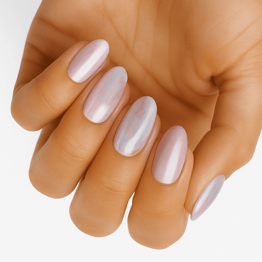Pink pearl shimmer nail wraps on hand showing luminous manicure finish