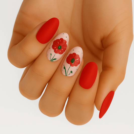 Red matte poppy nail wraps on hand showing floral nail art manicure