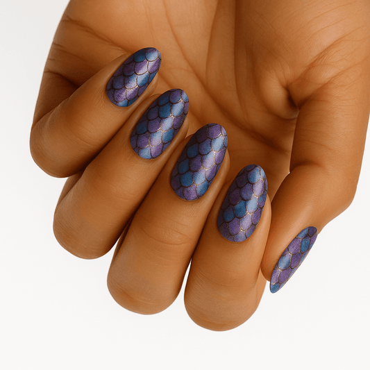Purple iridescent mermaid scale nail wraps with glitter finish on hand