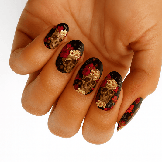 Gothic skull and roses nail wraps with dark floral pattern on hand