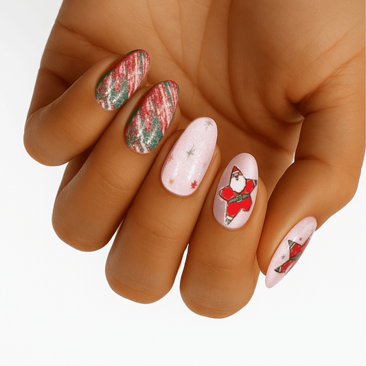 Christmas nail wraps on hand featuring Santa design, candy cane stripes, pink base with festive nail art