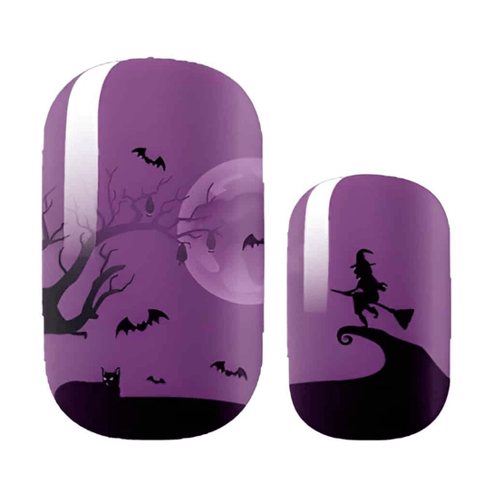 Purple Halloween nail wraps with spooky silhouettes including witch, bats and haunted tree design
