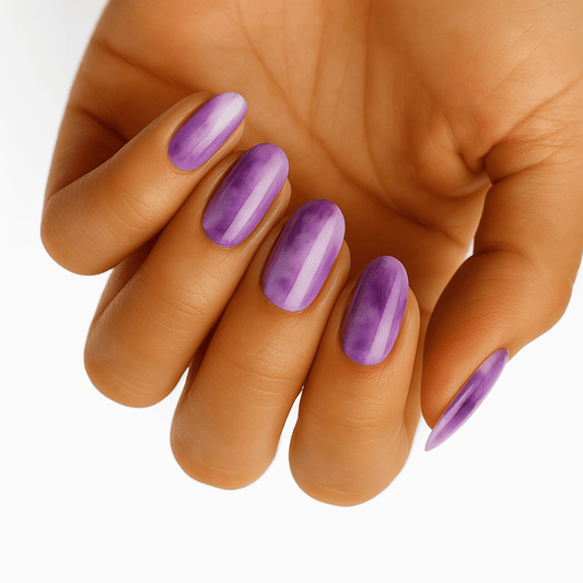 Purple glossy nail wraps on hand showing smooth chrome finish for gel manicure