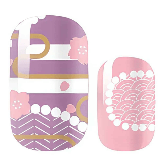 Pink and lavender gel nail wraps with geometric patterns and pearl accents