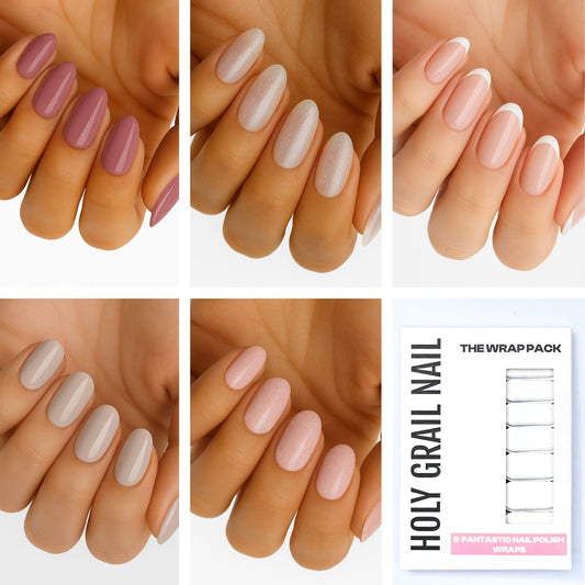 Light nude nail wraps on hands showing five natural pink and beige glossy shades