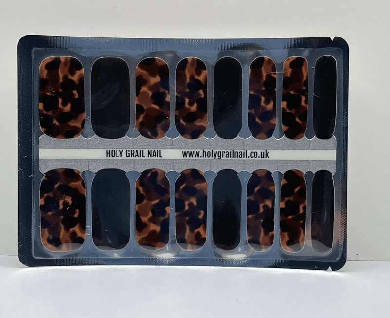 Sheet of tortoiseshell and black non-UV nail wraps with animal print design