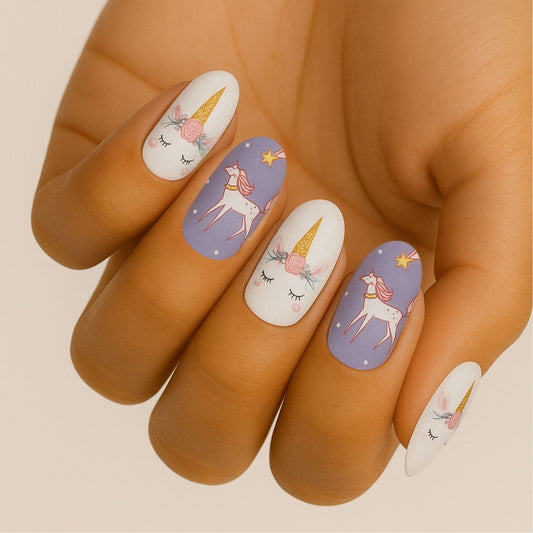 Unicorn nail art on hand featuring purple and white gel nail wraps with kawaii designs
