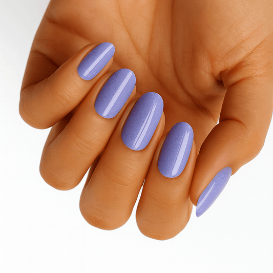 Lavender purple glossy nail wraps on hand showing elegant pastel manicure for at-home nail art
