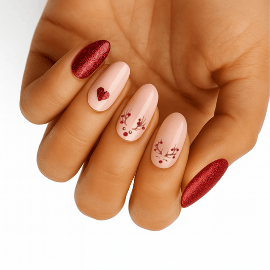 Red glitter and pink floral nail wraps on hand, festive christmas holiday nail art