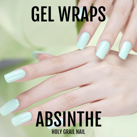 Mint green gel nail wraps on hand showing pastel absinthe colour manicure