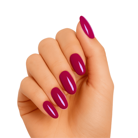 Bordeaux burgundy glossy gel nail wraps on hand showing deep red manicure