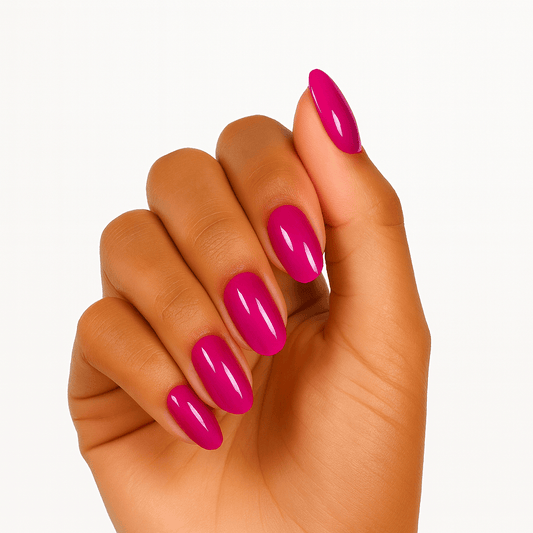 Glossy hot pink gel nail wraps on hand showing vibrant magenta manicure finish