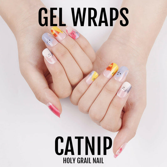 Colourful cat-themed gel nail wraps on hands with playful kitten designs in pink blue yellow
