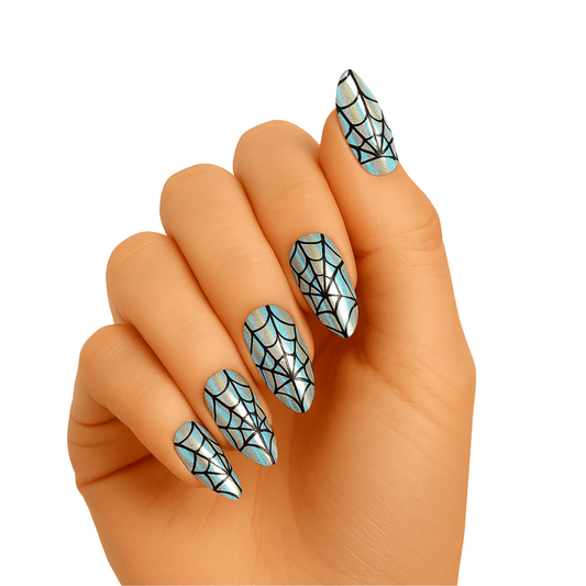 Holographic spider web gel nail wraps on hand showing black and silver geometric web design