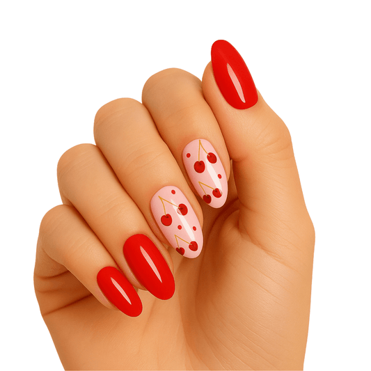 Red and pink cherry pattern gel nail wraps on hand showing glossy finish