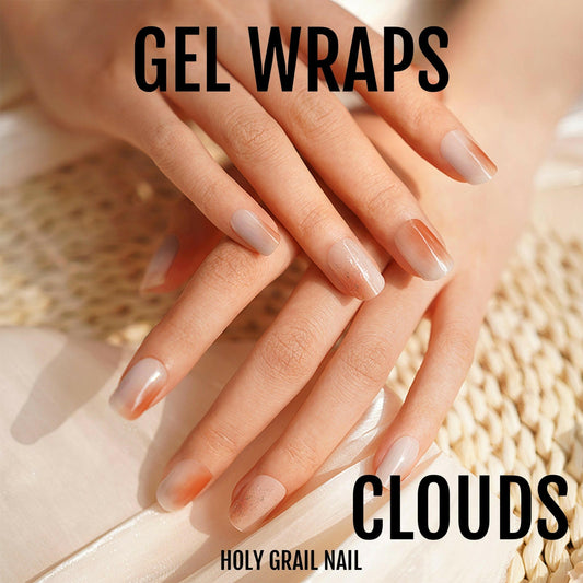Nude cloud pattern gel nail wraps on hand showing natural manicure look