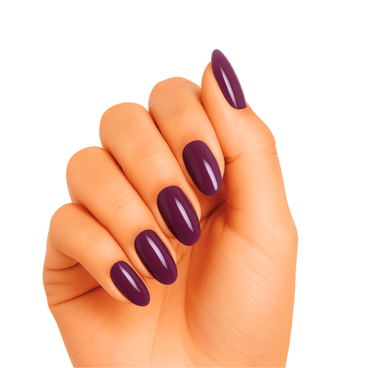 Hand displaying glossy deep purple grape gel nail wraps in rich burgundy finish