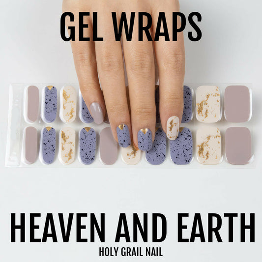 Gel nail wraps on hand featuring speckled blue and gold marble terrazzo pattern