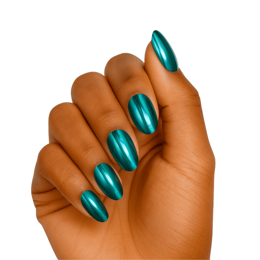 Hand wearing emerald green chrome gel nail wraps with mirror metallic finish