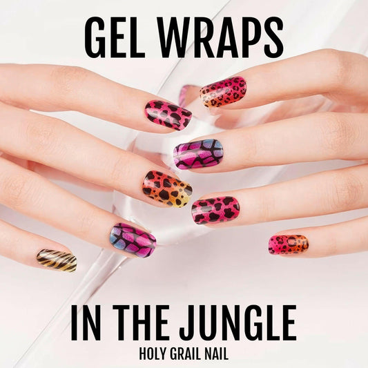 Gel nail wraps with vibrant animal print patterns on hands including leopard and zebra designs