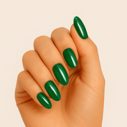 Emerald green holographic gel nail wraps on hand showing glossy finish