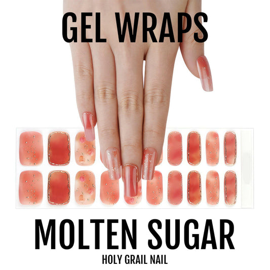 Coral pink glitter gel nail wraps displayed on hand with sparkle finish for glamorous manicure