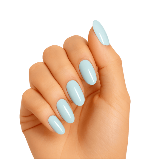 Hand wearing pastel blue glossy gel nail wraps in sea moss shade for at-home manicure