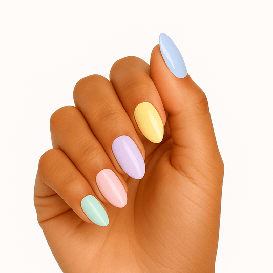 Pastel rainbow gel nail wraps on hand showing mint, pink, yellow and blue colours